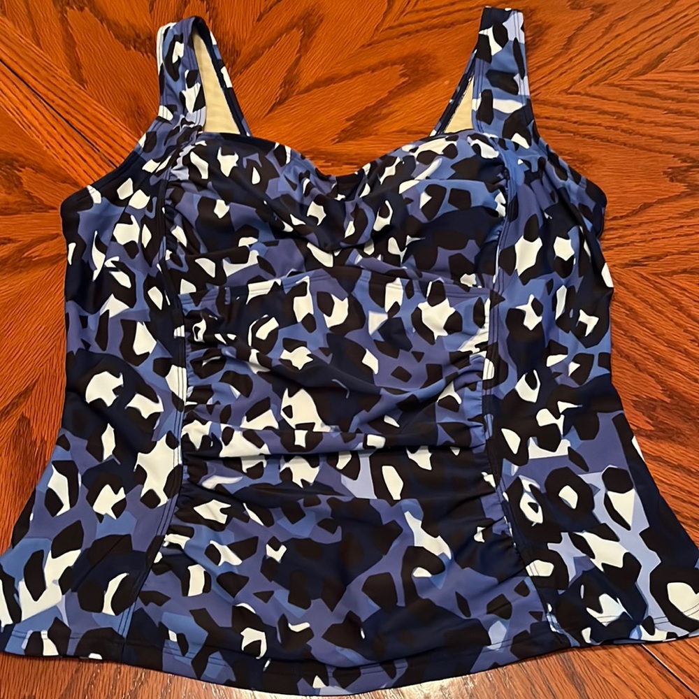 Women’s swim top.  Multicolored, padded bra, ruched front, flared bottom.